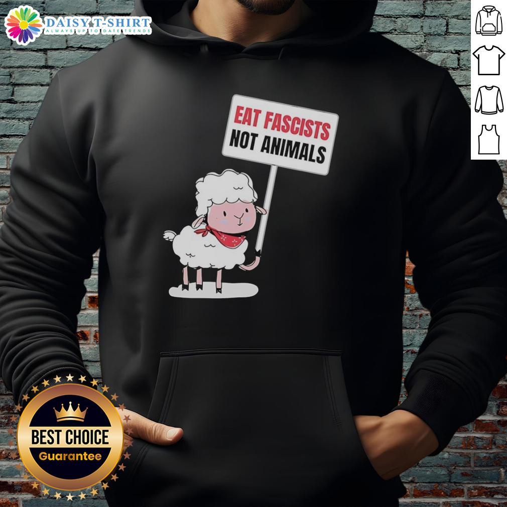 Funny hoodie featuring a sheep holding a sign that says Eat Fascists, Not Animals promoting animal rights.