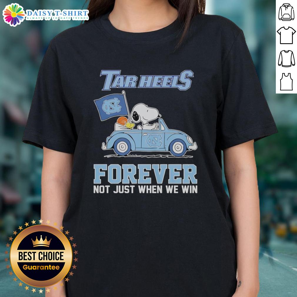 Alt Text: Good Snoopy and Woodstock diving design on North Carolina Tar Heels ladies tee, celebrating fandom beyond winning.