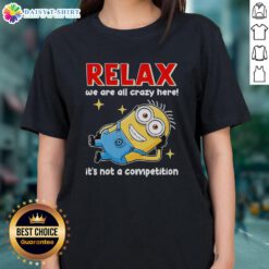Official Minion Relax We Are All Crazy Here It's Not A Competition Ladies Tee featuring colorful Minion graphics.