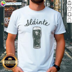 Original St Patrick's Day Slinte T-Shirt featuring festive green design and cheerful Irish motifs for holiday celebrations.