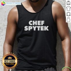 Top Chef Spytek wearing a stylish tank top, showcasing culinary passion and vibrant personality in the kitchen.