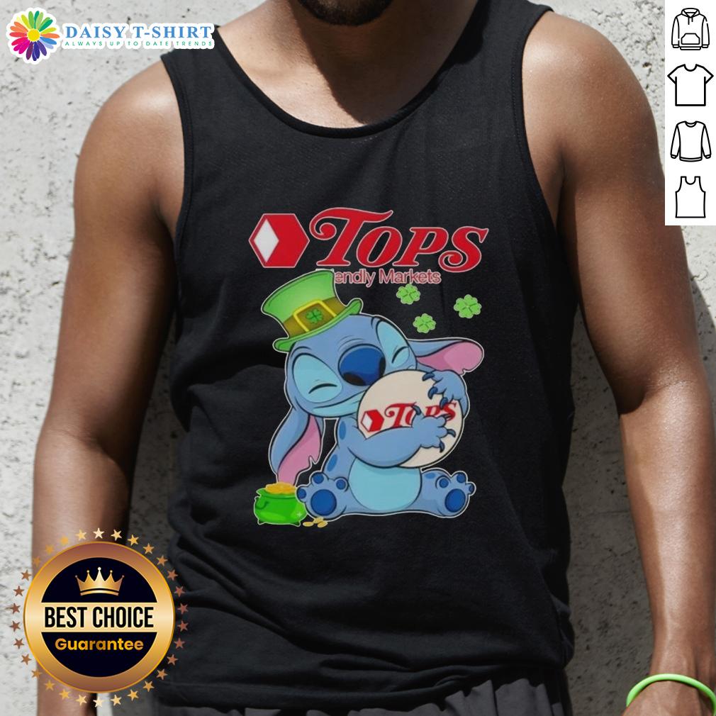 Top Stitch Hug Tops St. Patrick's Day tank top logo at Friendly Markets featuring vibrant green and festive design.