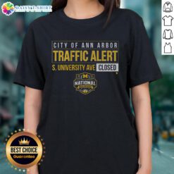 Alt Text: Good Michigan Wolverines MBB 2026 National Champions Ladies Tee on South University Ave, celebrating victory.