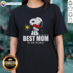 Hot Snoopy hugging a heart on a 'Best Mom in the World' ladies tee, perfect gift for loving mothers.