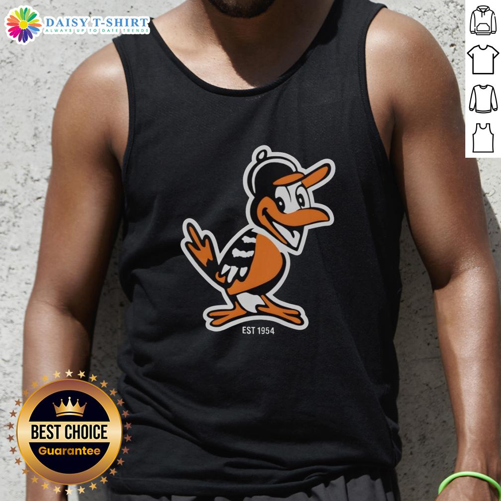Hot Zay wearing Baltimore Orioles mascot tank top, celebrating team spirit since 1954 at a lively outdoor event.