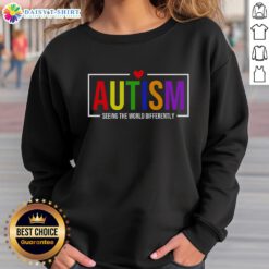 Official Autism Seeing The World Differently sweatshirt featuring a vibrant design celebrating neurodiversity and individuality.