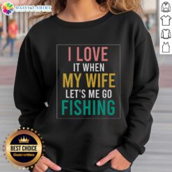 Official fishing quote sweatshirt featuring 'I Love When Wife Lets Me' design, perfect for fishing enthusiasts.