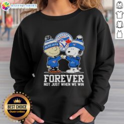 Charlie Brown fist pump in Toronto Blue Jays sweatshirt, celebrating team spirit with Snoopy. Forever, not just when we win!