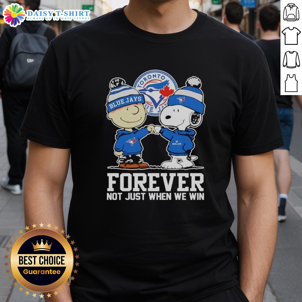 Alt Text: Charlie Brown fist pump with Snoopy wearing Toronto Blue Jays Forever T-shirt, celebrating sports spirit and fandom.