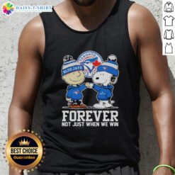 Alt Text: Charlie Brown fist pump with Snoopy in Toronto Blue Jays tank top, celebrating team spirit forever, not just during wins.