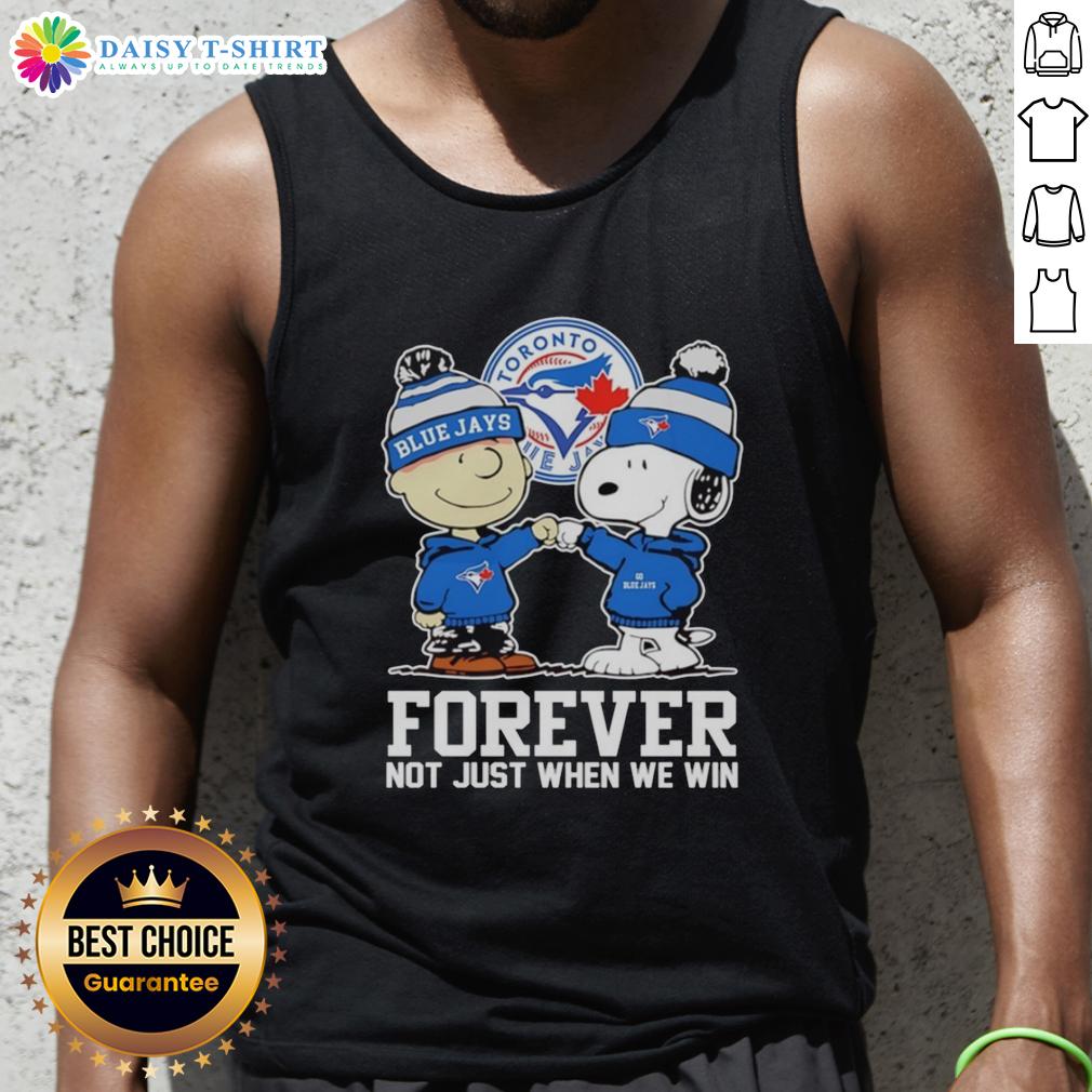 Alt Text: Charlie Brown fist pump with Snoopy in Toronto Blue Jays tank top, celebrating team spirit forever, not just during wins.