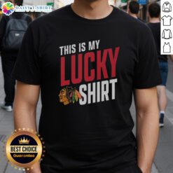 Top Chicago Blackhawks 'This Is My Lucky' T-shirt displayed on a hanger, showcasing team colors and logo.