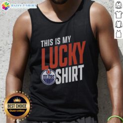 Alt Text: Fan wearing 'This Is My Lucky Tank Top' supporting the Edmonton Oilers at a game, showcasing team spirit and style.