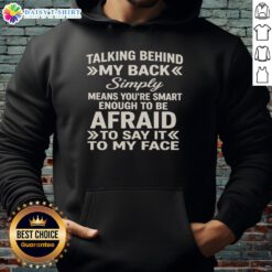 Black hoodie featuring 'Talking Behind My Back Means You're Smart Enough to Be Afraid' design, perfect for confident wearers.