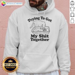 Awesome cat wearing 'Trying to Get My Shit Together' hoodie, showcasing a playful and humorous pet moment.