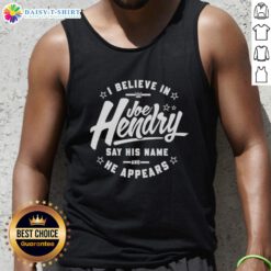 Joe Hendry WWE fan wearing a 'Good I Believe in Joe Hendry' tank top, showcasing his support for the wrestling star.
