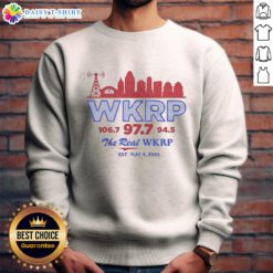 Retro WKRP sweatshirt with city skyline design, featuring Good-Wkrp-106.7, 97.7, and 94.5, Est. May 4, 2026.