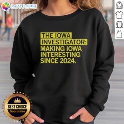 Alt Text: Stylish sweatshirt featuring 'Hot The Iowa Investigator - Making Iowa Interesting Since 2024' design for enthusiasts.