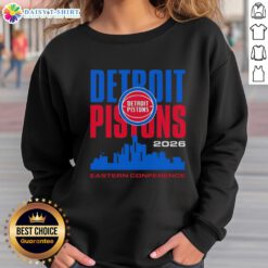 Vintage sweatshirt featuring Detroit Pistons NBA logo with city skyline design, perfect for fans of Eastern Conference basketball.