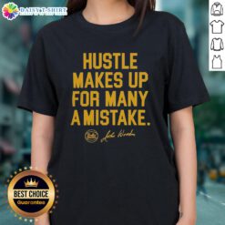 UCLA Bruins basketball team hustles under Coach John Wooden, showcasing teamwork and determination in 2026 ladies' tee design.