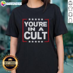 Satirical political statement tee featuring 'Nice, You're In A Cult' text with stars, perfect for ladies' casual wear.