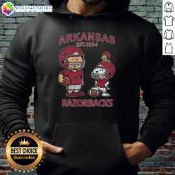 Official Charlie Brown and Snoopy Arkansas Razorbacks NCAA Football hoodie, celebrating team spirit since 1894.