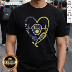 Milwaukee Brewers T-shirt featuring a stethoscope heartbeat design with 'It's A Work Of Heart' text for fans and health enthusiasts.