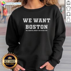 Boston Celtics 'Be Careful What You Wish For' sweatshirt featuring vibrant team colors and bold graphic design.