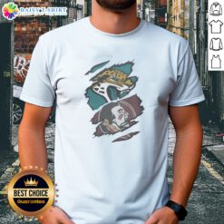 Funny Jacksonville Jaguars Florida State Seminoles Team Logo Shirt displayed on a hanger, perfect for fans.