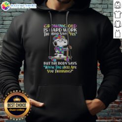 Funny Snoopy Growing Old Is Hard Work The Mind Says Yes But The Body Says What The Hell Are You Thinking Hoodie featuring a playful design