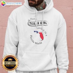 Funny To Just A Texas Girl Living In A Florida World Map State Hoodie in black, featuring bold text and map graphic