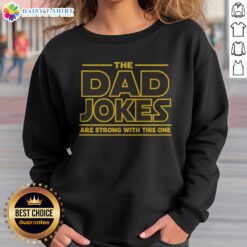 Hot The Dad Jokes Are Strong With The One Sweatshirt featuring a fun quote for dads