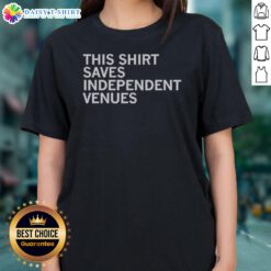 Nice This Shirt Saves Independent Venues Shirt displayed on a wooden background, highlighting its unique design.