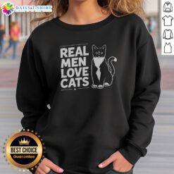 Original Real Men Love Cats Sweatshirt displayed on a flat surface, showcasing its unique design.