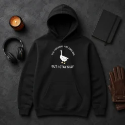 Hot Goose The Horrors Are Endless But I Stay Silly Hoodie in black with front graphic print, long sleeves, and adjustable hood