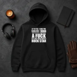 Hot If You'Re Doing The Sober Thing And It Feels Like No One Gives A F Keep The Plug In The Jug I Do Hoodie in black, front view with bold text design