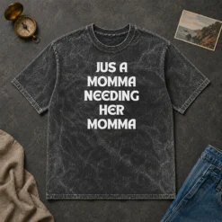Hot Jus A Momma Needing Her Momma printed on a soft washed t shirt in a relaxed fit