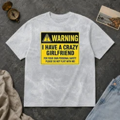 Hot Warning I Have A Crazy Girlfriend For Your Own Personal Safety Please Do Not Flirt With Me 0 printed on a soft washed t shirt