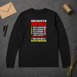 Official Dear Racists In America You Live On Is Native American long sleeve shirt in black, front view with clear text design