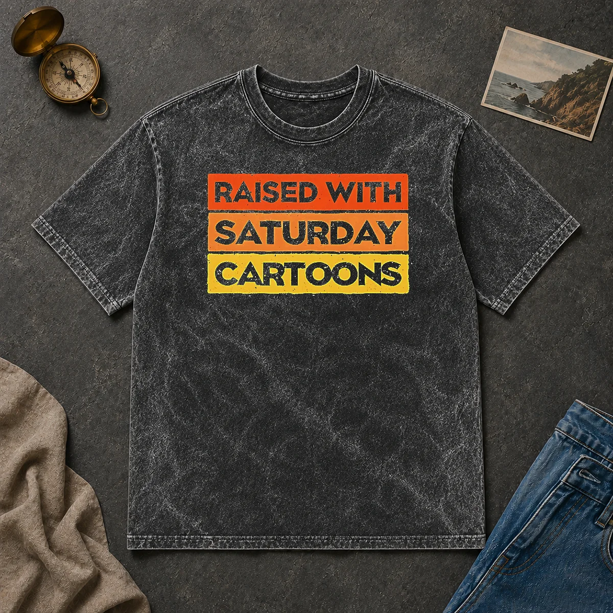 Official Raised With Saturday Cartoons Retro 90s Washed T Shirt Official Raised With Saturday Cartoons Retro 90s Washed T Shirt in vintage washed fabric with retro 90s print
