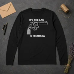 Original Hot It'S The Law In Kennesaw Gun Revolver long sleeve shirt in dark color with bold front graphic