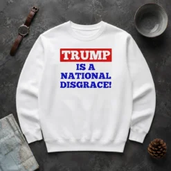 Original Trump Is A National Disgrace Political Protest Sweater in black with bold white text on front